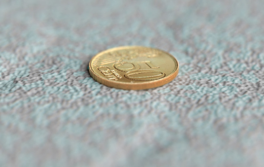 Monedas con patrón proyectado