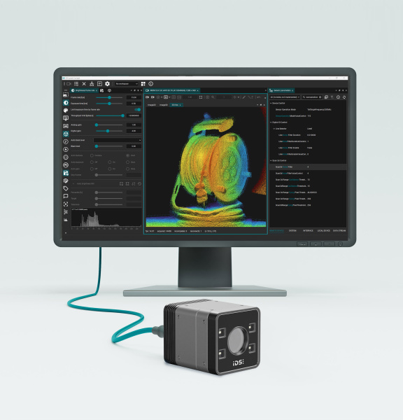Cámara 3D situada delante de un monitor con una nube de puntos de colores y una interfaz de software