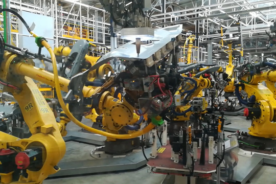 Cámaras industriales IDS en uso con robots industriales.