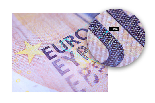 Un campo ampliado en un billete de euro muestra el zoom de la uEye XC.