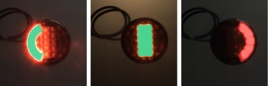3 imágenes de una lámpara de vehículo multicámara con una luz verde o roja activada en cada caso.