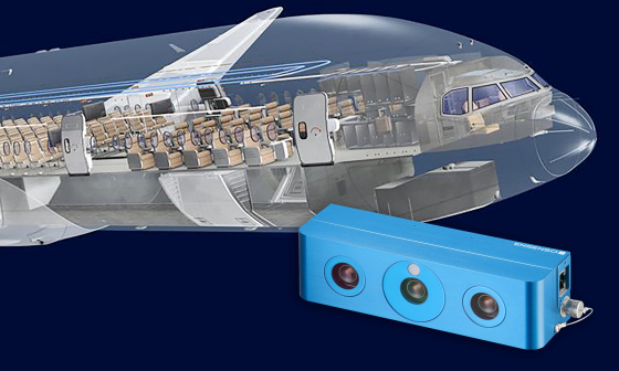 Parte delantera de un avión, vista del interior de la cabina, con una cámara 3D Ensenso en primer plano