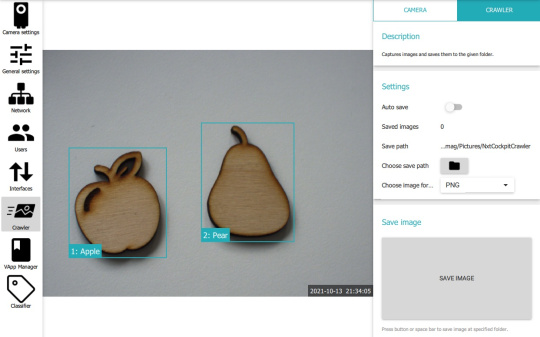 Interfaz de usuario de la cabina del IDS NXT, que reconoce dos formas de madera -una manzana y una pera- y les proporciona cajas delimitadoras y etiquetas.
